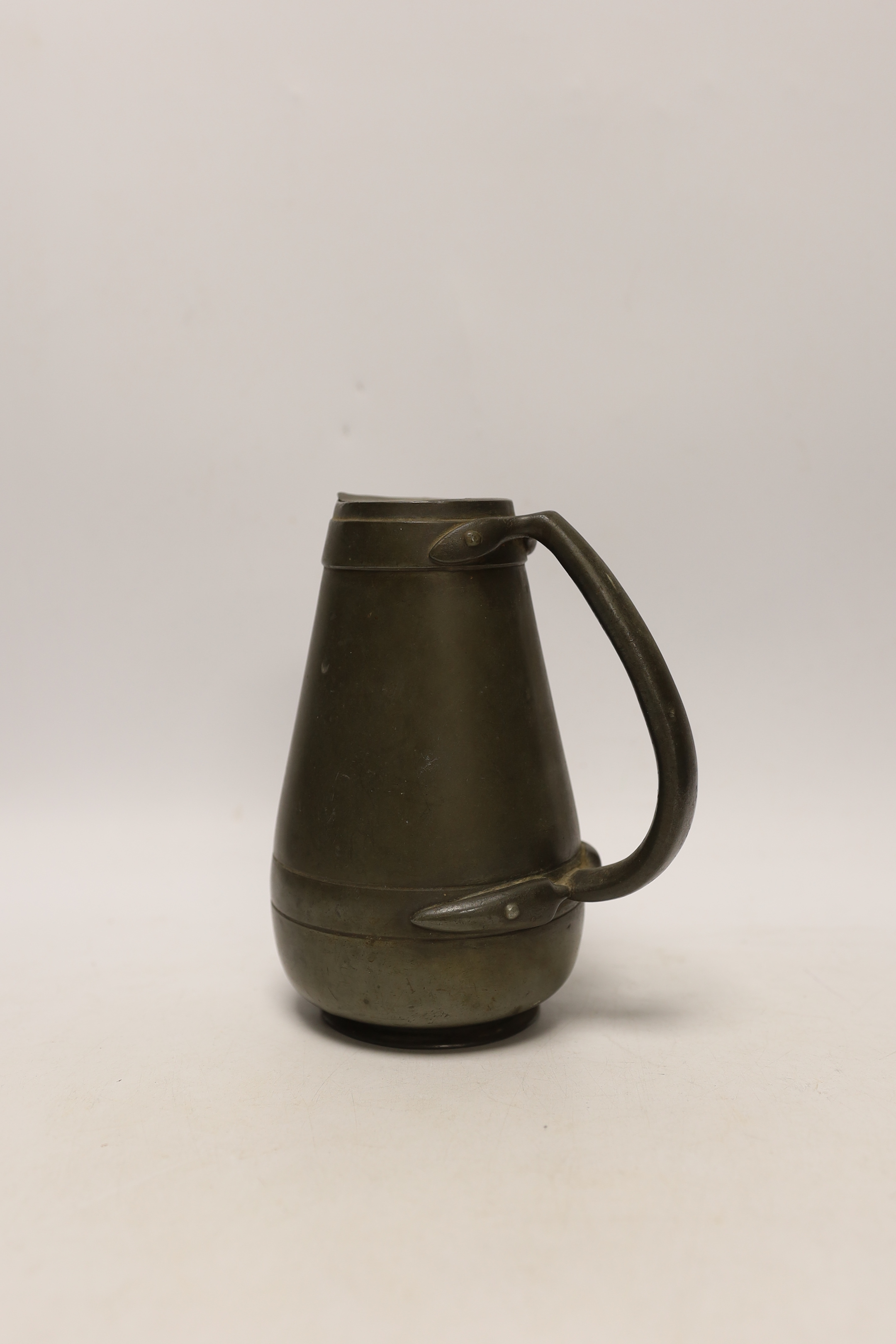 A Liberty Tudric pewter water jug, 17cm high